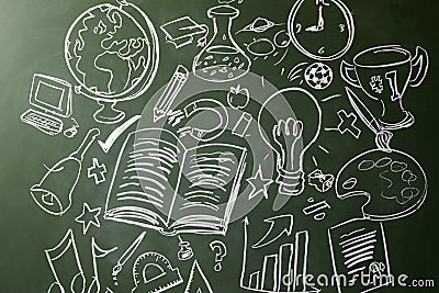 Hand drawn symbols of school subjects on a chalkboard Stock Photo