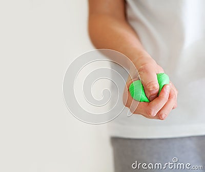 Hand with exercises putty manufacturer Stock Photo