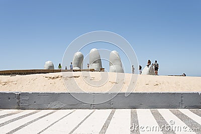 The Hand, Fingers or Man Emerging into Life, sculpture located in Punta del Este Editorial Stock Photo