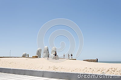 The Hand, Fingers or Man Emerging to Life, sculpture located in Punta del Este Editorial Stock Photo