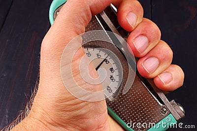 Hand force gauge measuring the strength of the hand Stock Photo