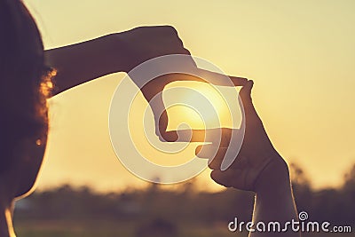 hand framing view distant Stock Photo
