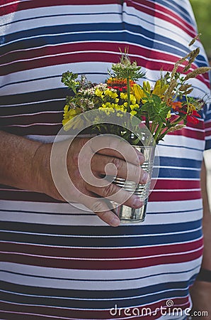 A hand full for fresh wildflowers Stock Photo