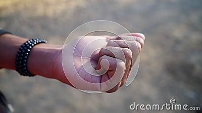 Fingers in folded style and expressing to Taking blessing. Sign language and hand gesture concept Stock Photo