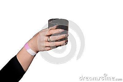 The hand of girl glass of alcoholic beverage on a white background, isolated, holiday weekend Stock Photo
