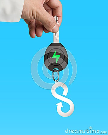 Hand give electric car key infinity arrow sheet metal keyring Stock Photo