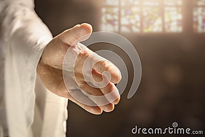 Hand of God or Jesus reaching out Stock Photo