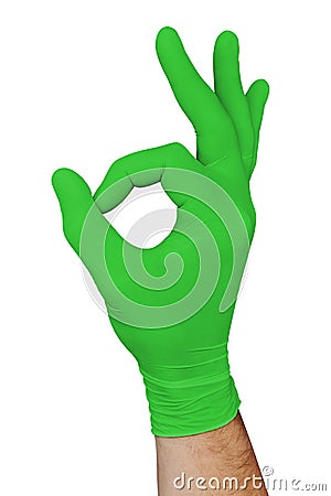 Hand in green medical glove showing approval ok sign isolated on white background Stock Photo