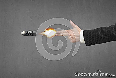 Hand gun gesture with fire, bullet and money symbol Stock Photo