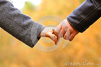 Hand-in-hand Stock Photo