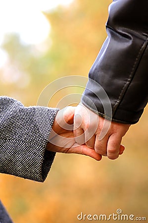 Hand-in-hand Stock Photo