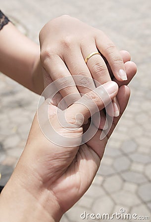 Hand-in-hand Stock Photo