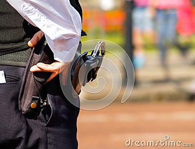 Hand and handgun Stock Photo