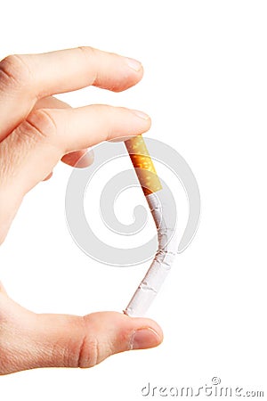 The hand hold a cigarette. Harm of smoking Stock Photo