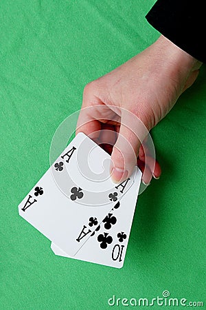Hand holding best classic blackjack combination ten and ace of c Stock Photo