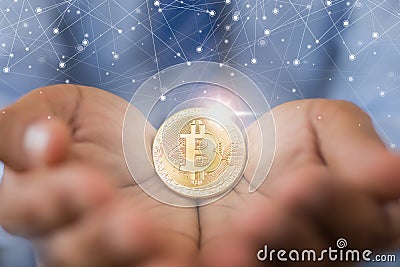 Hand holding bitcoin.business and finance Stock Photo
