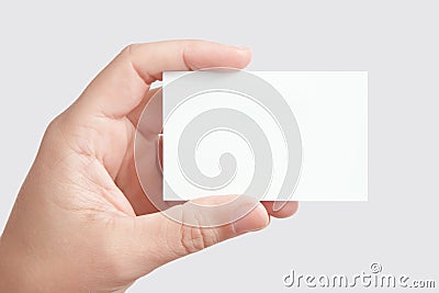 Hand holding blank business card Stock Photo