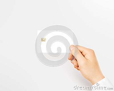 Hand holding blank white credit card mockup isolated. Stock Photo