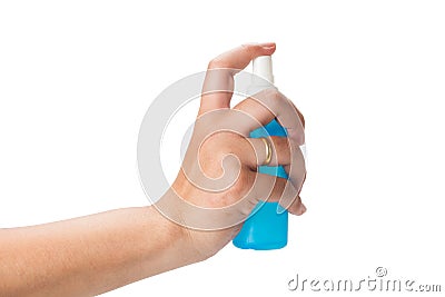 Hand holding blue color spay bottle Stock Photo
