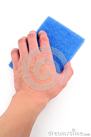 Hand holding blue scrubber Stock Photo