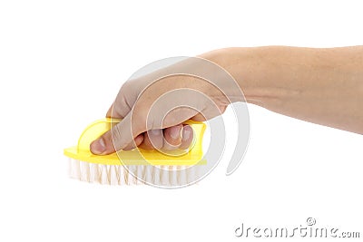 Hand holding a brush isolated on white background Stock Photo