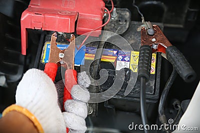 Hand holding car repair tools Stock Photo