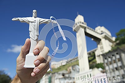 Hand Holding Christ Souvenir at Salvador Brazil Lacerda Elevator Editorial Stock Photo