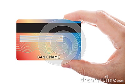 Hand holding credit card isolated on white background Stock Photo