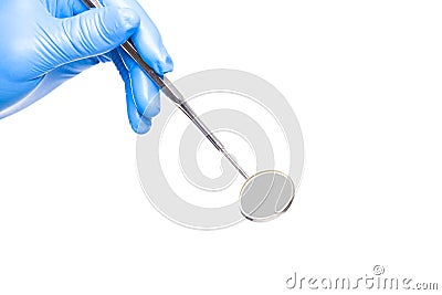 Hand holding a dental tool isolated on white background. Stock Photo