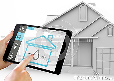 Hand holding digital tablet with home security icons on screen Stock Photo