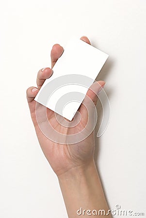 Hand holding an empty business card Stock Photo