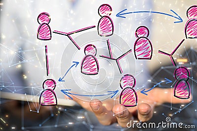 Hand holding floating pink icons of people - a structure of world economy, communication, network Stock Photo