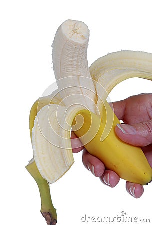 Hand holding a fresh banana Stock Photo