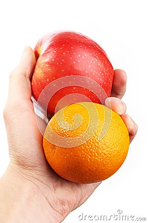 Hand holding fruit. Apple orange Stock Photo