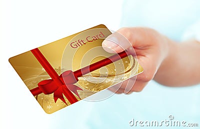 Hand holding gift card isolated over white Stock Photo