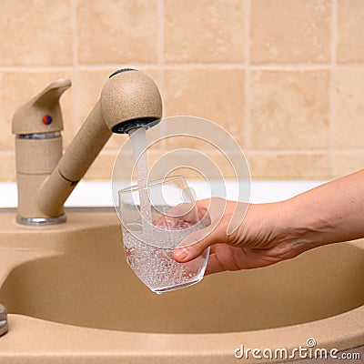 A glass of water from the sink Stock Photo