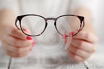 Hand holding glasses Stock Photo