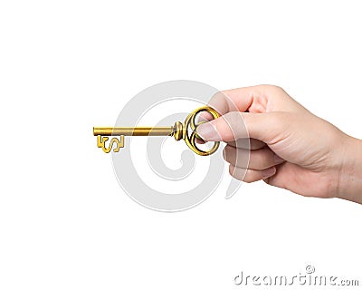 Hand holding golden treasure key in dollar sign shape Stock Photo