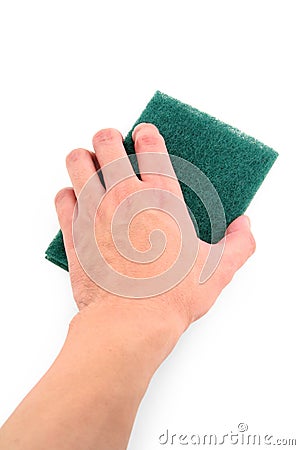 Hand holding green scrubber Stock Photo