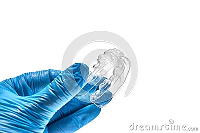 Hand holding individual dental tray for bleaching teeth Stock Photo