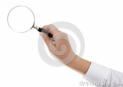 Hand holding magnifying glass Stock Photo