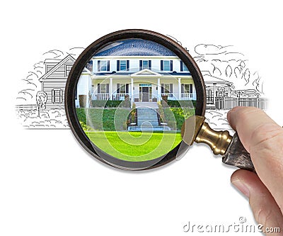 Hand Holding Magnifying Glass Reveals Finished House Build Over Drawing Stock Photo
