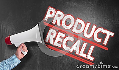 Hand holding megaphone against blackboard with text PRODUCT RECALL Stock Photo