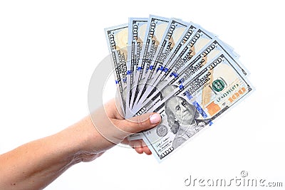 Hand holding a new hundred dollar bills U.S. folded like a fan, Stock Photo