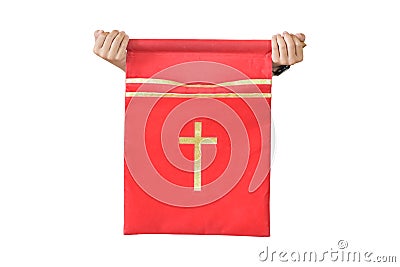 Hand holding offering bag in church for collecting tithing Stock Photo