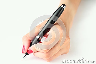 Hand holding a pen Stock Photo