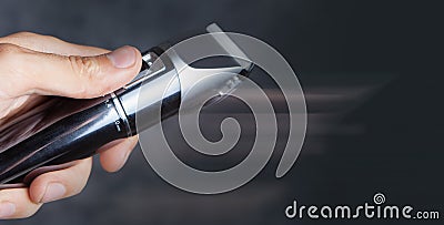 Hand holding shaving machine Stock Photo