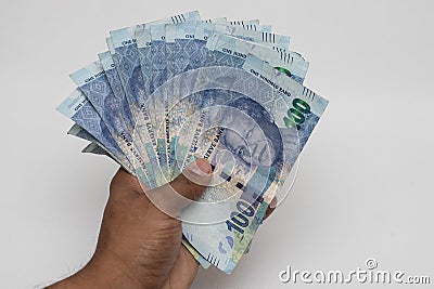 Hand holding south african rands Editorial Stock Photo