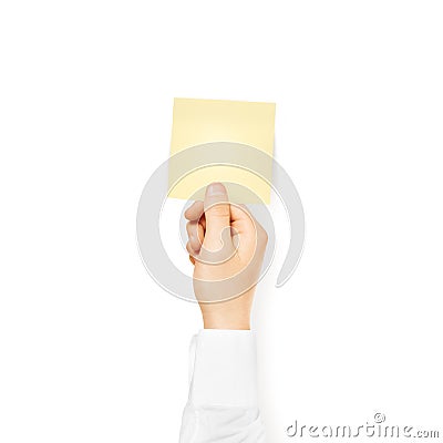 Hand holding square blank yellow sticker mock up isolated. Stick Stock Photo