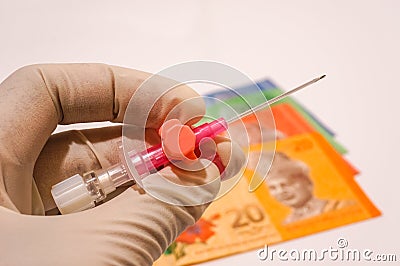 Hand holding sterile branula Stock Photo